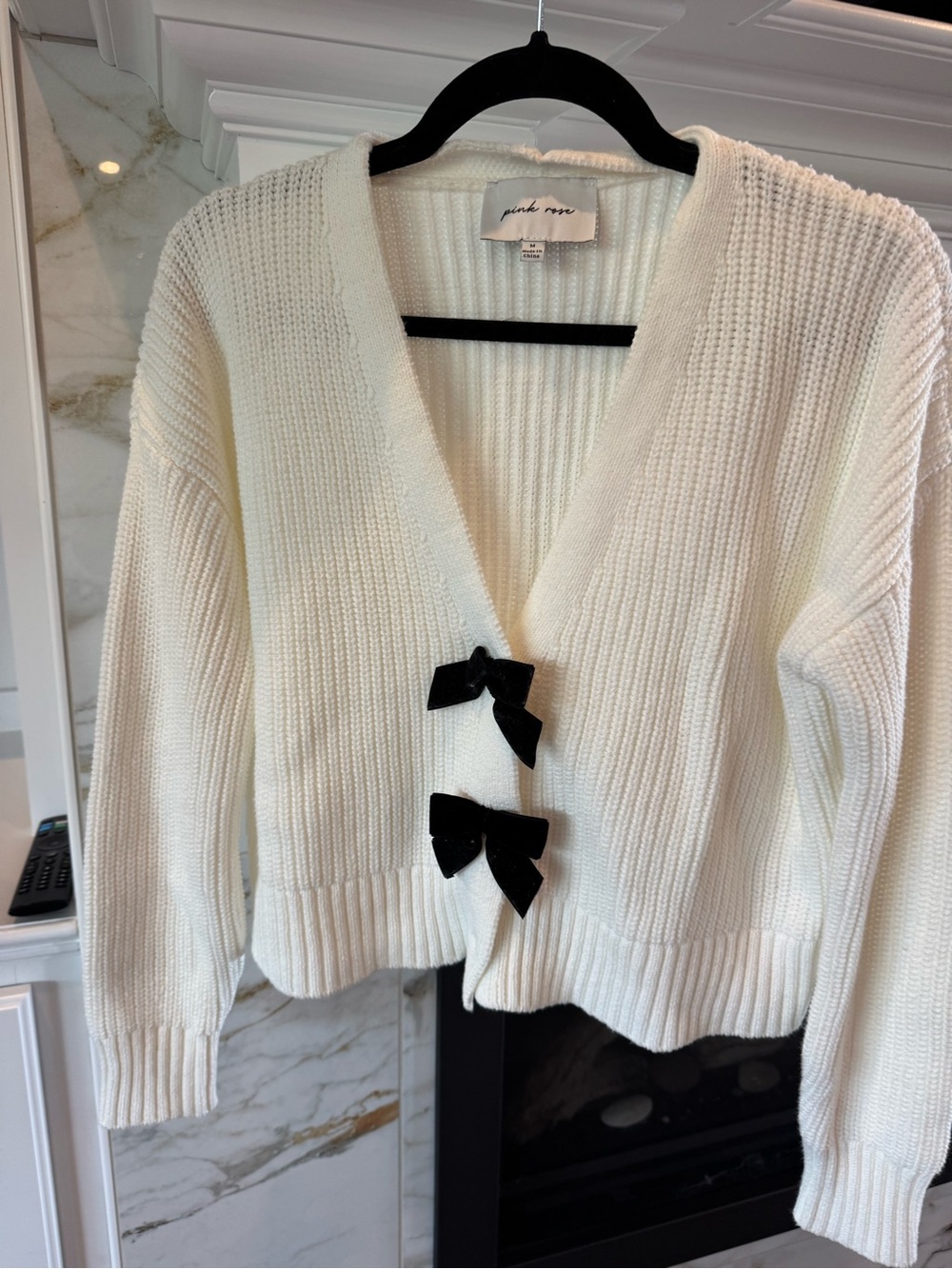 Pink Rose Ivory Cardigan with Black Bow Accents